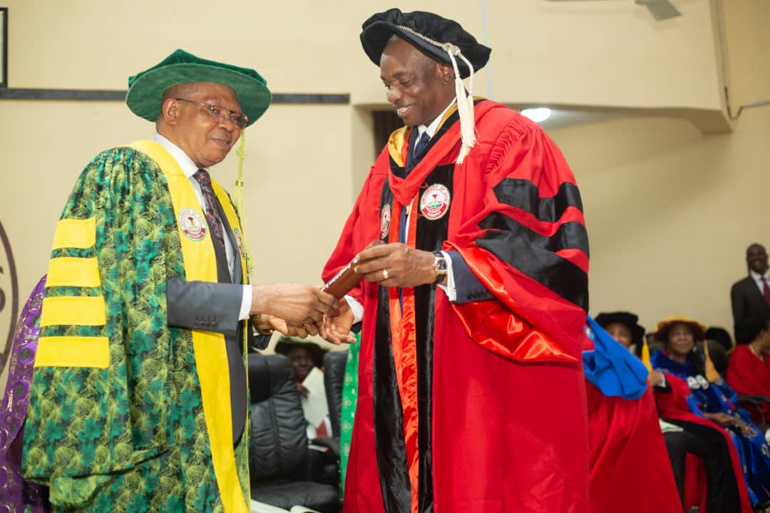The Vice Chancellor, University of Uyo, Prof. Nyaudoh Ndaeyo proclaiming the conferment of Doctor of Law on Udom Inoyo
